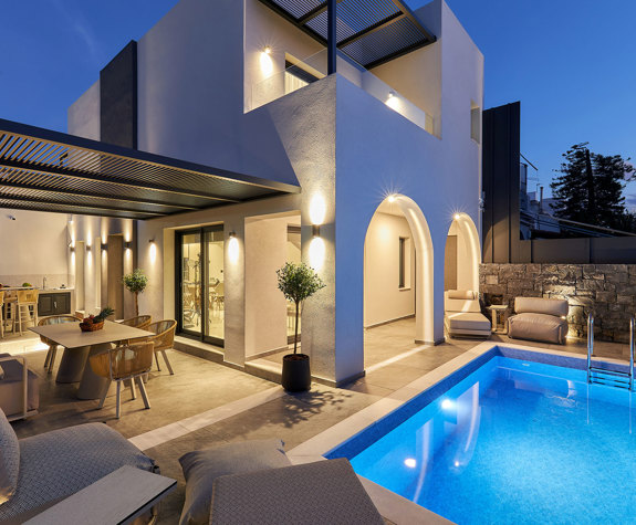 Grey Stones Villa Ammoudara exterior view from yard with pool